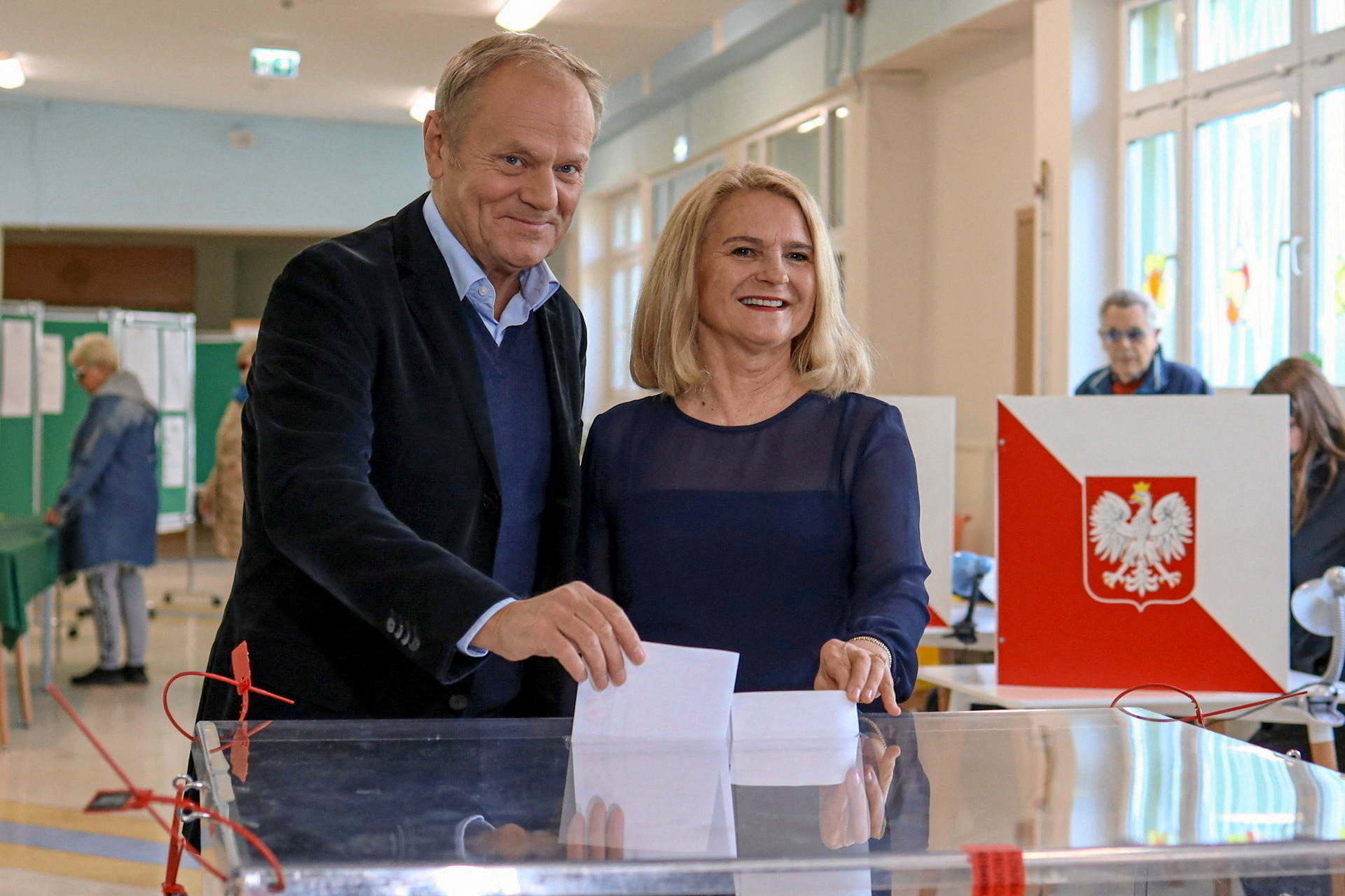 Polish Prime Minister Donald Tusk and his wife Malgorzata vote during the first round of the presidential election, at a polling station in Sopot, Poland, May 18, 2025. /Michal Ryniak/Agencja Wyborcza.pl/Reuters