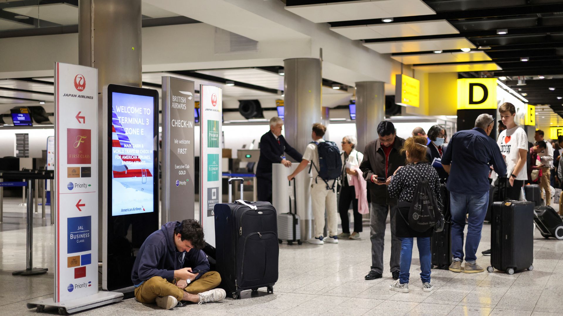Flight-disrupted travelers wait at London's Heathrow airport. /Hollie Adams/Reuters